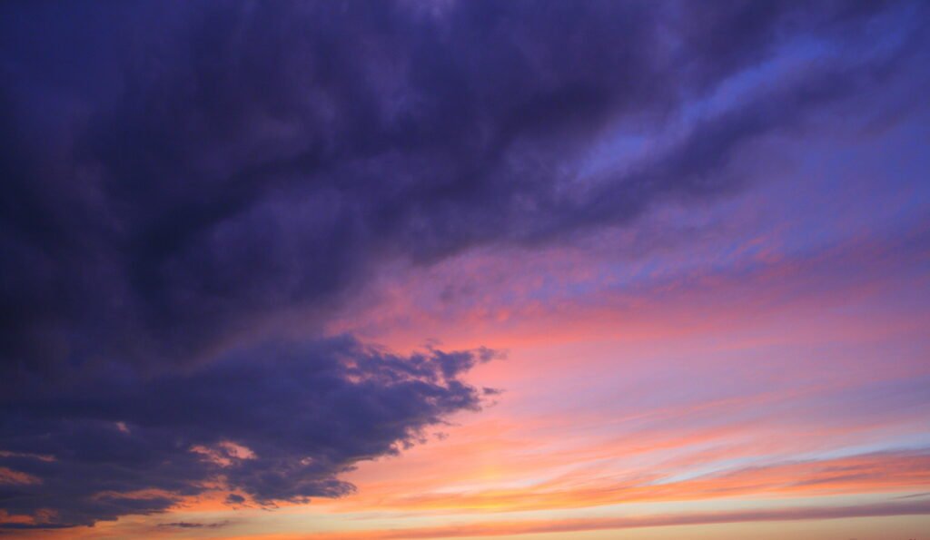 Soft violet, rose, and gold evening light over Bafflin Sanctuary in Pomfret, Connecticut.